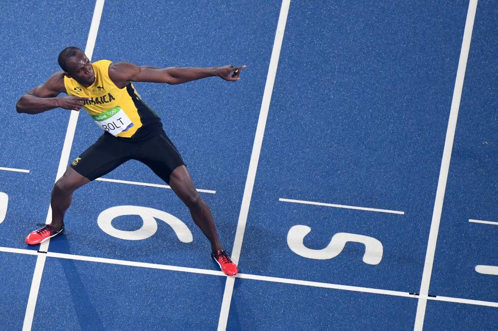 A história da famosa pose das vitórias de Usain Bolt
