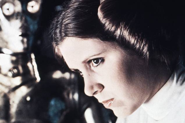 Carrie Fisher no filme "Star Wars: Episódio IV - Uma Nova Esperança", de George Lucas. Carrie Fisher no filme "Star Wars: Episódio IV - Uma Nova Esperança", de George Lucas.