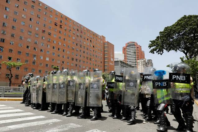 Polícia venezuelana reprime manifestações da oposição em Caracas Polícia venezuelana reprime manifestações da oposição em Caracas
