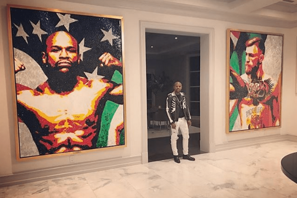 Mayweather tem quadro (gigante) de McGregor em sua sala