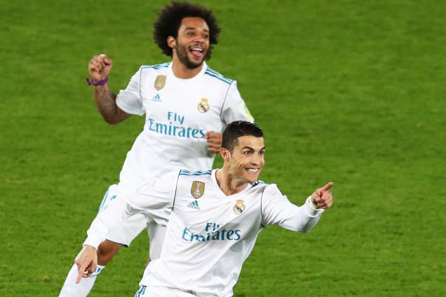 Cristiano Ronaldo comemora após marcar gol de falta durante partida contra o Grêmio, válida pela final do Mundial de Clubes da FIFA, realizada no Estádio Xeique Zayed, em Abu Dhabi - 16/12/2017 Cristiano Ronaldo comemora após marcar gol de falta durante partida contra o Grêmio, válida pela final do Mundial de Clubes da FIFA, realizada no Estádio Xeique Zayed, em Abu Dhabi - 16/12/2017