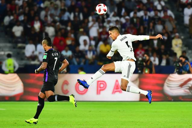 Raphael Varane (dir) disputa lance com Caio (esq), do Al Ain, durante partida válida pela final do Mundial de Clubes da FIFA - 22/12/2018 Raphael Varane (dir) disputa lance com Caio (esq), do Al Ain, durante partida válida pela final do Mundial de Clubes da FIFA - 22/12/2018
