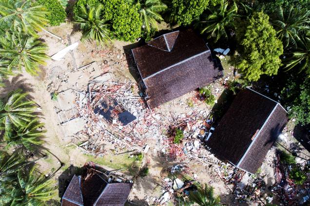 Vista aérea mostra residências afetadas no distrito de Carita, na Indonésia, após forte tsunami atingir a região - 24/12/2018 Vista aérea mostra residências afetadas no distrito de Carita, na Indonésia, após forte tsunami atingir a região - 24/12/2018