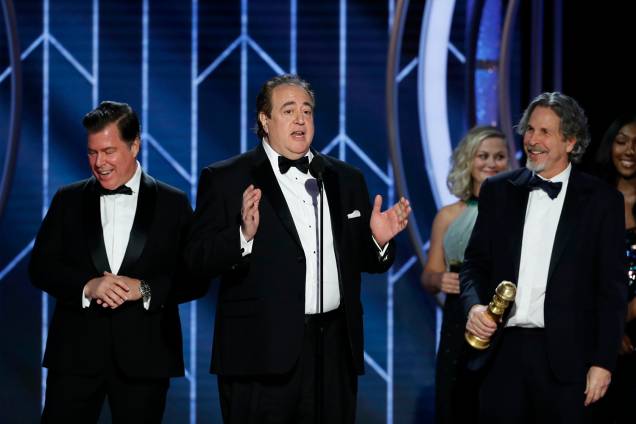 Peter Farrelly, Nick Vallelonga e Brian Currie ganham prêmio na categoria de melhor roteiro por "Green Book'', durante cerimônia do Globo de Ouro - 07/01/2019 Peter Farrelly, Nick Vallelonga e Brian Currie ganham prêmio na categoria de melhor roteiro por "Green Book'', durante cerimônia do Globo de Ouro - 07/01/2019