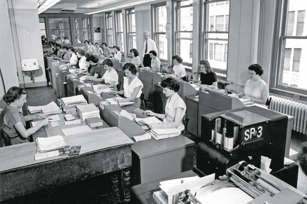 Office Workers Entering Data Office Workers Entering Data