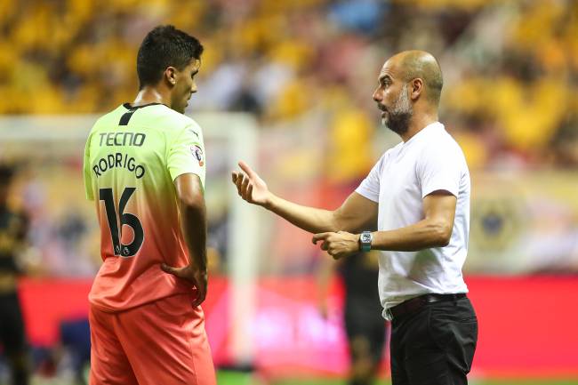 Rodri e Pep Guardiola, do Manchester City Rodri e Pep Guardiola, do Manchester City