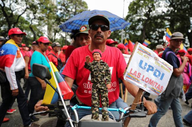 Supporters of Venezuela’s President Nicolas Maduro attend a rally against U.S. President Donald Trump in Caracas Supporters of Venezuela’s President Nicolas Maduro attend a rally against U.S. President Donald Trump in Caracas