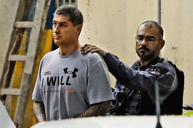 GATILHO – Ronnie Lessa, acusado de atirar em Marielle: próximo da milícia Ronnie Lessa: o PM reformado alega que era colecionador e que suas armas desapareceram, mas foi condenado pelo seu descarte