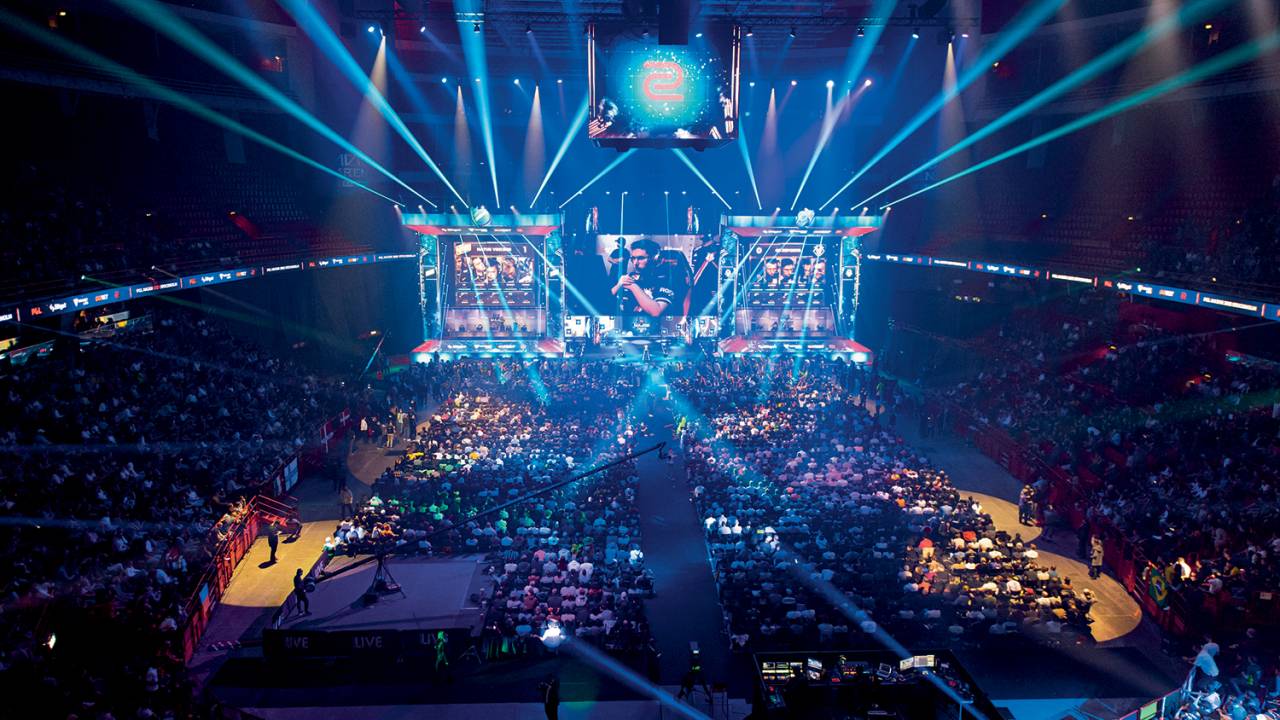 Supporters cheer during the final game between the Team Natus Vincere and the Team G2 Esports at the PGL Counter-Strike Major event, on November 7, 2021 in Stockholm, Sweden. (Photo by Jonathan NACKSTRAND / AFP)