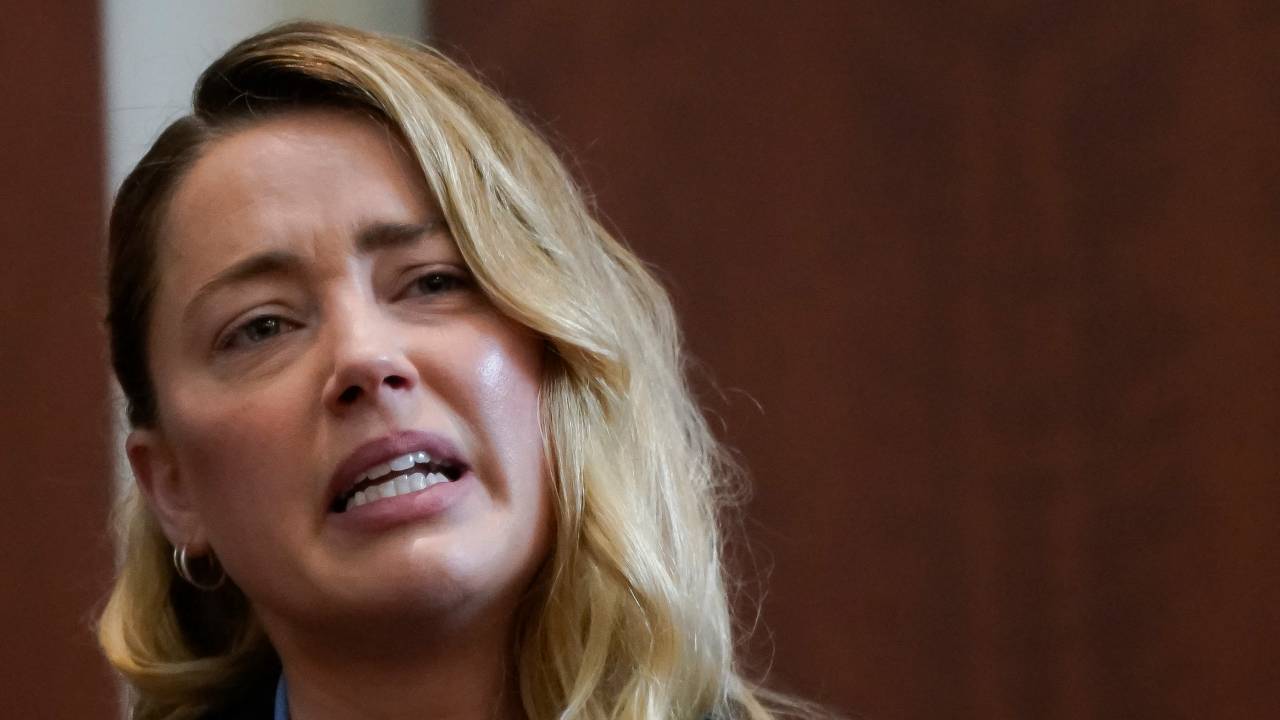 Actor Amber Heard testifies about the first time her ex-husband, actor Johnny Depp hit her, at Fairfax County Circuit Court during a defamation case against her by Depp in Fairfax, Virginia, on May 4, 2022. - US actor Johnny Depp sued his ex-wife Amber Heard for libel in Fairfax County Circuit Court after she wrote an op-ed piece in The Washington Post in 2018 referring to herself as a "public figure representing domestic abuse." (Photo by ELIZABETH FRANTZ / POOL / AFP)