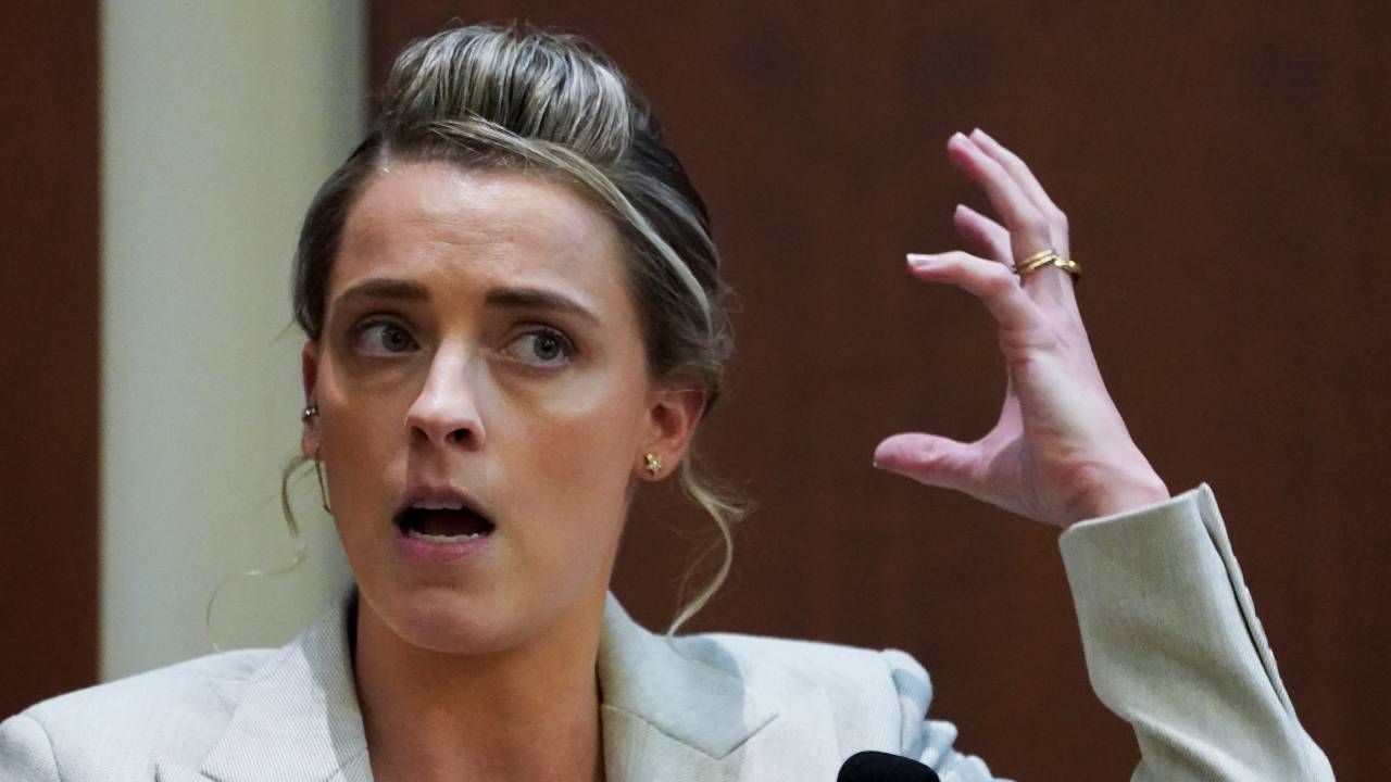 Whitney Henriquez, sister of Actor Amber Heard, testifies on the stand during Johnny Depp's defamation trial against ex-wife Amber Heard at the Fairfax County Circuit Courthouse in Fairfax, on May 18, 2022. - US actor Johnny Depp is suing ex-wife Amber Heard for libel after she wrote an op-ed piece in The Washington Post in 2018 referring to herself as a public figure representing domestic abuse. (Photo by KEVIN LAMARQUE / POOL / AFP)