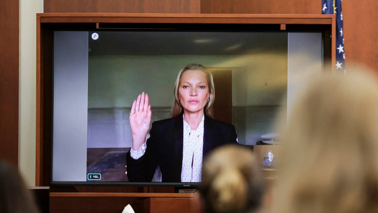 Model Kate Moss is sworn in via video link at the Fairfax County Circuit Courthouse in Fairfax, Virginia, on May 25, 2022. - Actor Johnny Depp is suing ex-wife Amber Heard for libel after she wrote an op-ed piece in The Washington Post in 2018 referring to herself as a public figure representing domestic abuse. (Photo by EVELYN HOCKSTEIN / POOL / AFP)