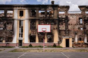 SOKOLNYKY, KHARKIV, UKRAINE - 2022/04/22: An exterior view of a destroyed school in northeast Kharkiv. A school that used to be occupied by Russian soldiers is now in Ukraine's hands, as Ukrainian troops have recaptured the area. (Photo by Alex Chan Tsz Yuk/SOPA Images/LightRocket via Getty Images)