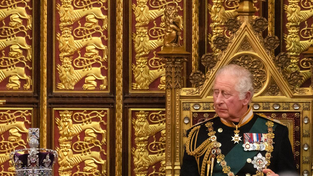 LONDON, ENGLAND - MAY 10: Prince Charles, Prince of Wales looks towards the Imperial State Crown as he delivers the Queen’s Speech during the state opening of Parliament at the House of Lords on May 10, 2022 in London, England. The State Opening of Parliament formally marks the beginning of the new session of Parliament. It includes Queen's Speech, prepared for her to read from the throne, by her government outlining its plans for new laws being brought forward in the coming parliamentary year. This year the speech will be read by the Prince of Wales as HM The Queen will miss the event due to ongoing mobility issues. (Photo by Dan Kitwood/Getty Images)