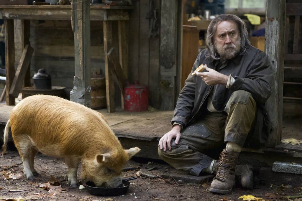 PIG.jpeg SOLITÁRIO - O ator no filme Pig: drama elogiado sobre um ermitão e seu porco -