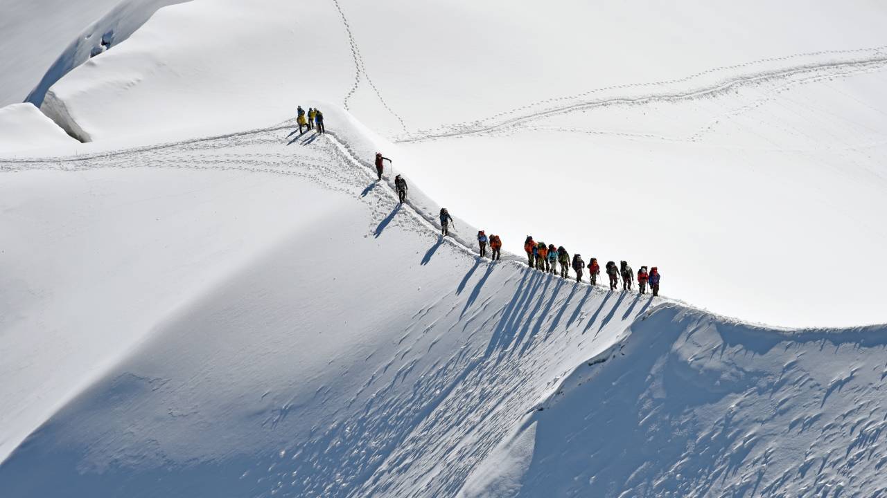 Roped climbers , Mont-Blanc, France, Europe. (Photo by: Franco Cappellari/REDA&CO/Universal Images Group via Getty Images)