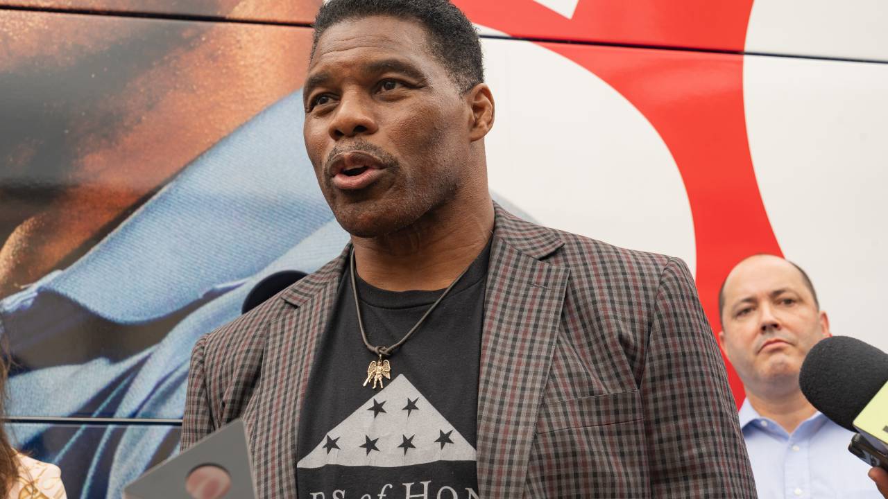 GWINNETT, GA - SEPTEMBER 09: U.S. Republican Senate candidate for Georgia, Herschel Walker speaks to media at a campaign event on September 9, 2022 in Gwinnett, Georgia. Heisman Trophy winner Herschel Walker is running against incumbent Democratic Senator Raphael Warnock for November's election.(Photo by Megan Varner/Getty Images)