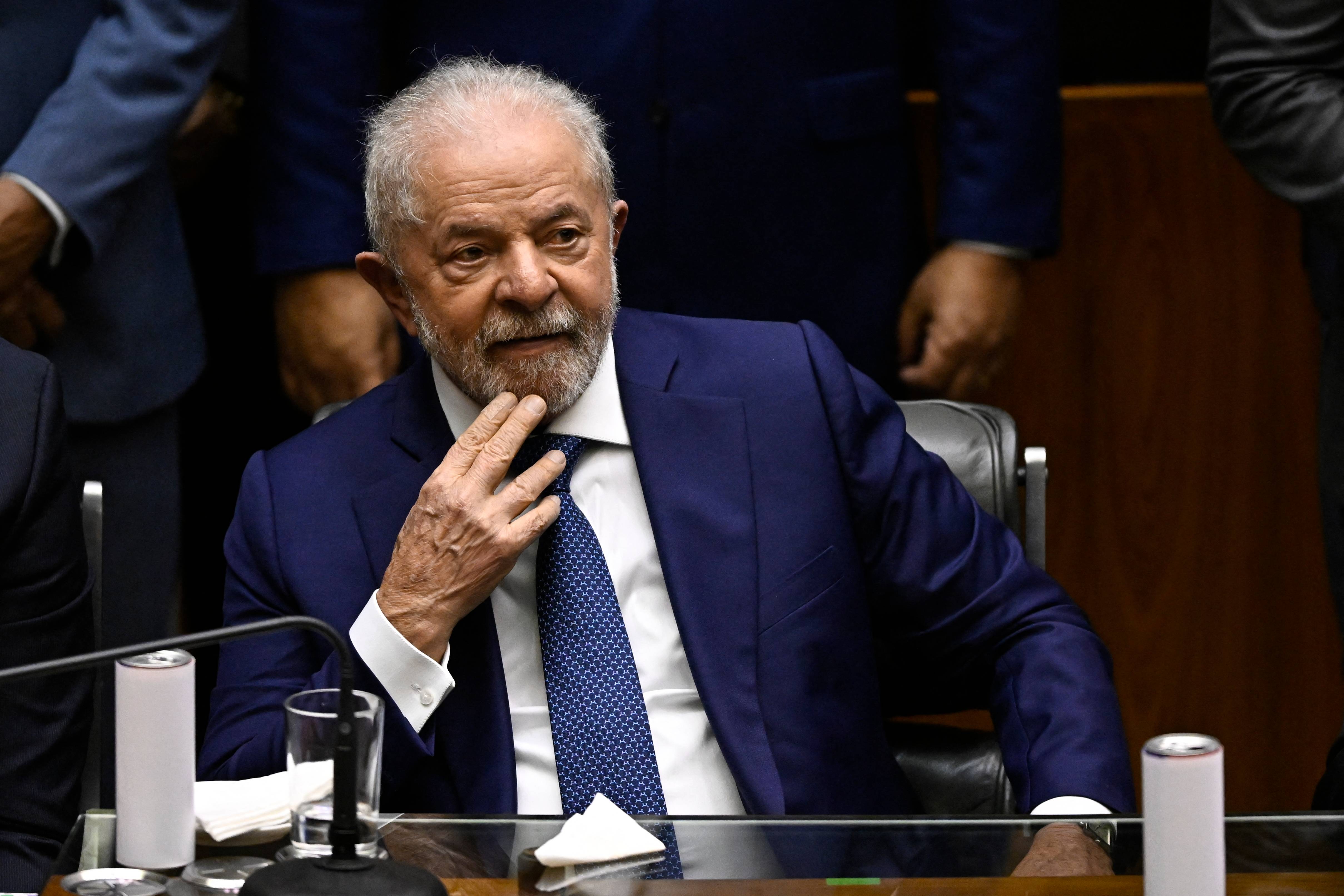 Brazil's President-elect Luiz Inacio Lula da Silva looks on during his inauguration ceremony at the National Congress, in Brasilia, on January 1, 2023. - Lula da Silva, a 77-year-old leftist who already served as president of Brazil from 2003 to 2010, takes office for the third time with a grand inauguration in Brasilia. (Photo by MAURO PIMENTEL / AFP)