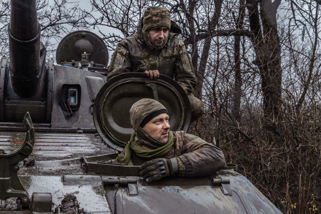 BAKUMUT AREA,UKRAINE - NOVEMBER 19: Members of the Tank crew from the 58th brigade of the Ukrainian army take part in the artillery barrage against the Russian offensive on Bakhmut and its surroundings n November 19,2022 outside of Bakhmut, Ukraine .The last inhabitants who remained there only leave their homes for vital reasons, to find water, food, wood. Since the Russian invasion of Ukraine in February 2022, most of the residents of Bakhmut have fled with only a handful of residents left. The town near the front line of the invasion has been shelled since June 2022 with some buildings now a pile of rubble. (Photo Laurent Van der Stockt for Le Monde/Getty Images)