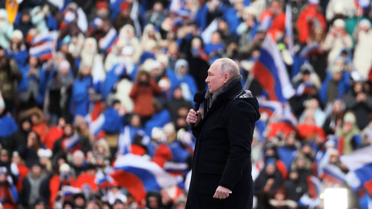 Russian President Vladimir Putin attends a patriotic concert dedicated to the upcoming Defender of the Fatherland Day at the Luzhniki stadium in Moscow on February 22, 2023. (Photo by Mikhail METZEL / SPUTNIK / AFP)