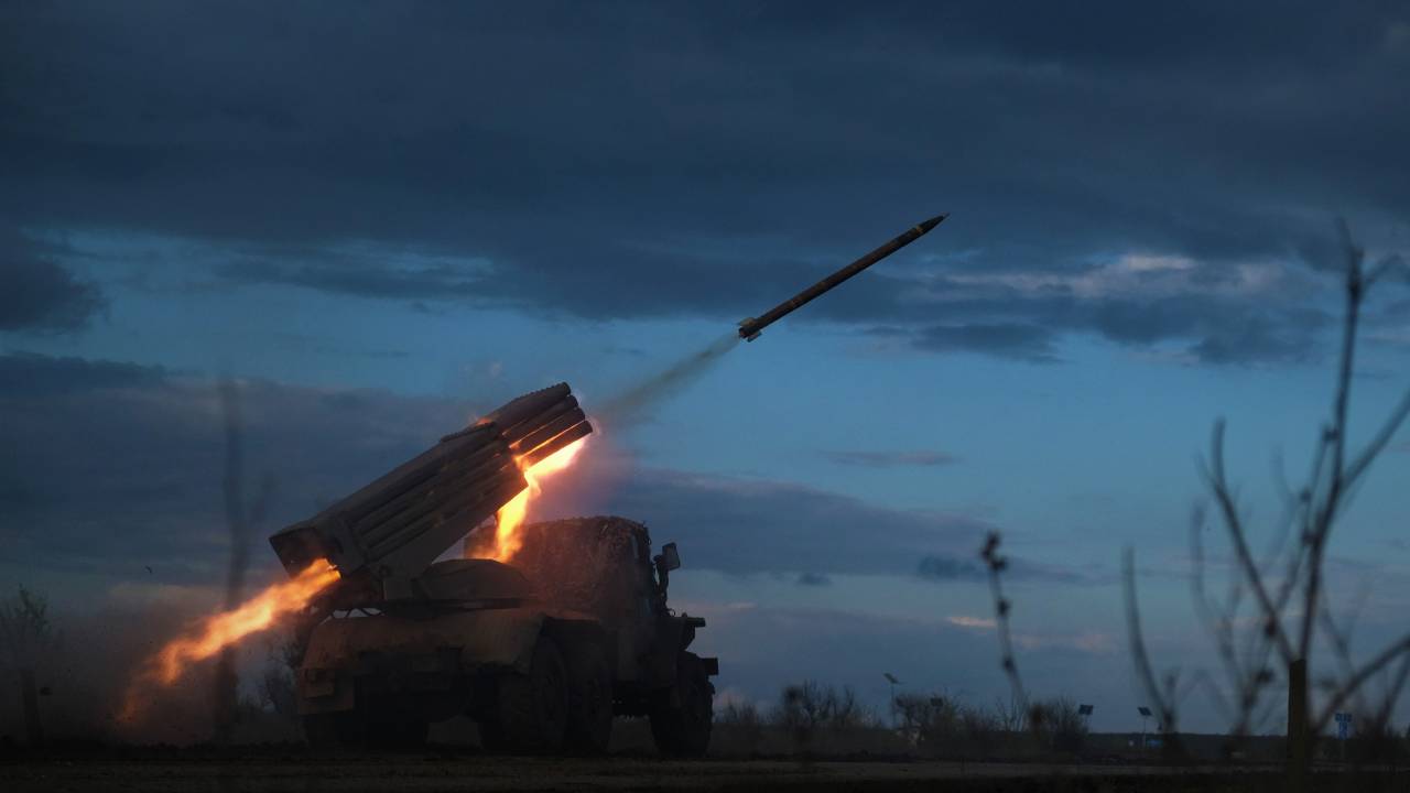 A BM-21 Grad multiple rocket launcher fires towards Russian positions on the frontline near Bakhmut, Donetsk region, on April 23, 2023, amid the Russian invasion on Ukraine. (Photo by Sergey SHESTAK / AFP)
