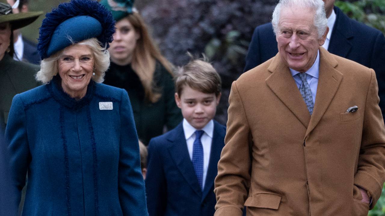 SANDRINGHAM, NORFOLK - DECEMBER 25: King Charles III, Camilla, Queen Consort and Prince George of Wales (C) attend the Christmas Day service at St Mary Magdalene Church on December 25, 2022 in Sandringham, Norfolk. King Charles III ascended to the throne on September 8, 2022, with his coronation set for May 6, 2023. (Photo by Mark Cuthbert/UK Press via Getty Images)