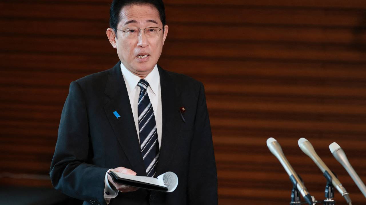 Japan's Prime Minister Fumio Kishida answers questions from reporters after North Korea announced it would launch a satellite, at the prime minister's office in Tokyo on May 29, 2023. (Photo by JIJI Press / AFP) / Japan OUT