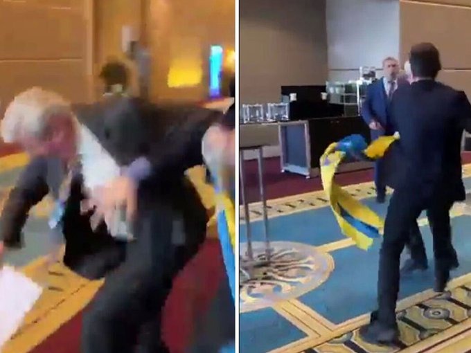 Delegado russo é repetidamente socado por membro ucraniano após roubar bandeira ucraniana em evento na Turquia. 04/05/2023 -