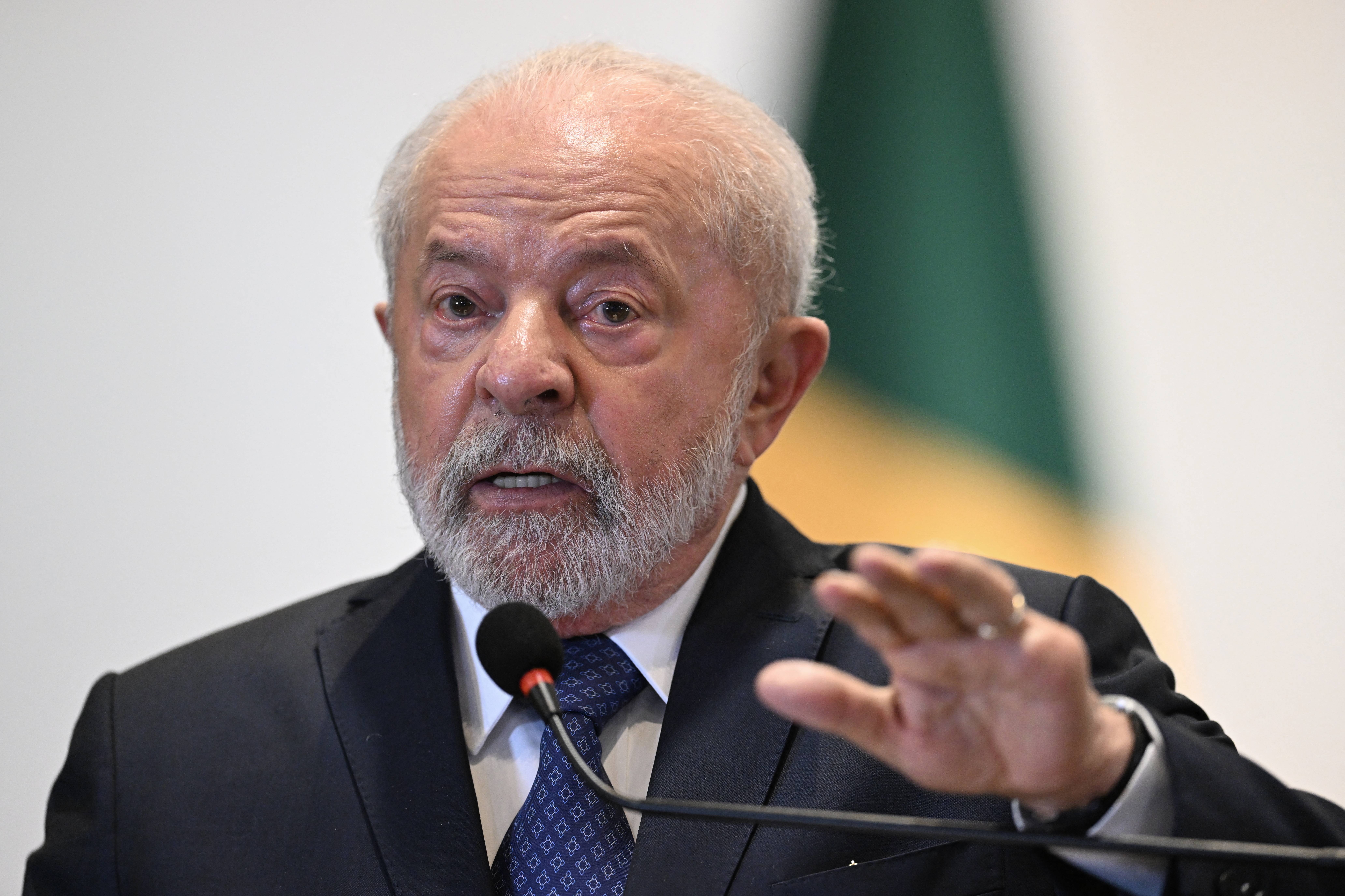 (FILES) Brazilian President Luiz Inacio Lula da Silva speaks to the press after a summit of South American leaders, at Itamaraty Palace in Brasilia on May 30, 2023. President Luiz Inacio Lula da Silva has been in diplomatic hyperdrive since taking office, making Brazil a key global player again -- but stoking controversy with some of his stances, including on Ukraine and Venezuela. Less than six months into his term, the veteran leftist has already met more foreign leaders than his predecessor, far-right ex-president Jair Bolsonaro, did in four years -- 33 to 32, according to a count by newspaper O Globo. (Photo by EVARISTO SA / AFP)