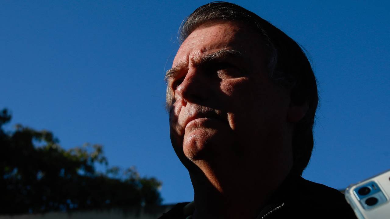 Former Brazilian President Jair Bolsonaro delivers a press conference at the Juscelino Kubitschek airport in Brasilia on June 29, 2023. Judges will continue delivering verdicts Thursday on charges that far-right ex-president Jair Bolsonaro broke the law with his unproven allegations against Brazil's election system, which could see him banned from holding office for eight years. (Photo by Sergio Lima / AFP)