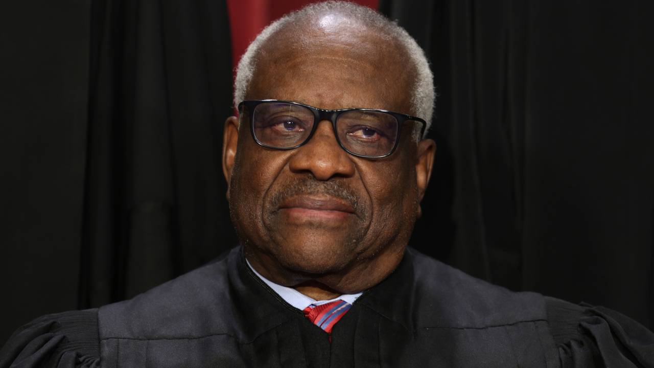 WASHINGTON, DC - OCTOBER 07: United States Supreme Court Associate Justice Clarence Thomas poses for an official portrait at the East Conference Room of the Supreme Court building on October 7, 2022 in Washington, DC. The Supreme Court has begun a new term after Associate Justice Ketanji Brown Jackson was officially added to the bench in September. (Photo by Alex Wong/Getty Images)