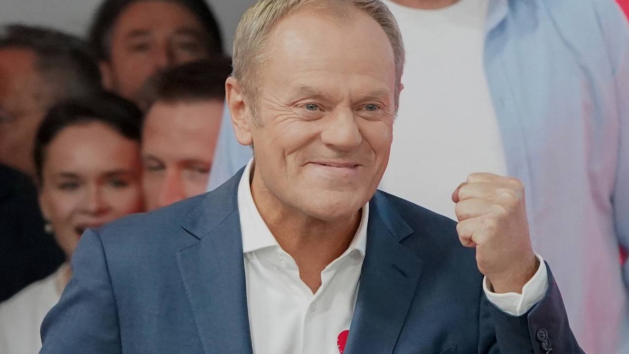 Poland's main opposition leader, former premier and head of the centrist Civic Coalition bloc, Donald Tusk addresses supporters at the party's headquarters in Warsaw, Poland on October 15, 2023, after the presentation of the first exit poll results of the country's parliamentary elections. Poland's liberal Civic Coalition led by former EU chief Donald Tusk and two smaller opposition parties have a majority over the ruling populists and the far-right, an exit poll from Sunday's election showed. (Photo by JANEK SKARZYNSKI / AFP) / ALTERNATE CROP