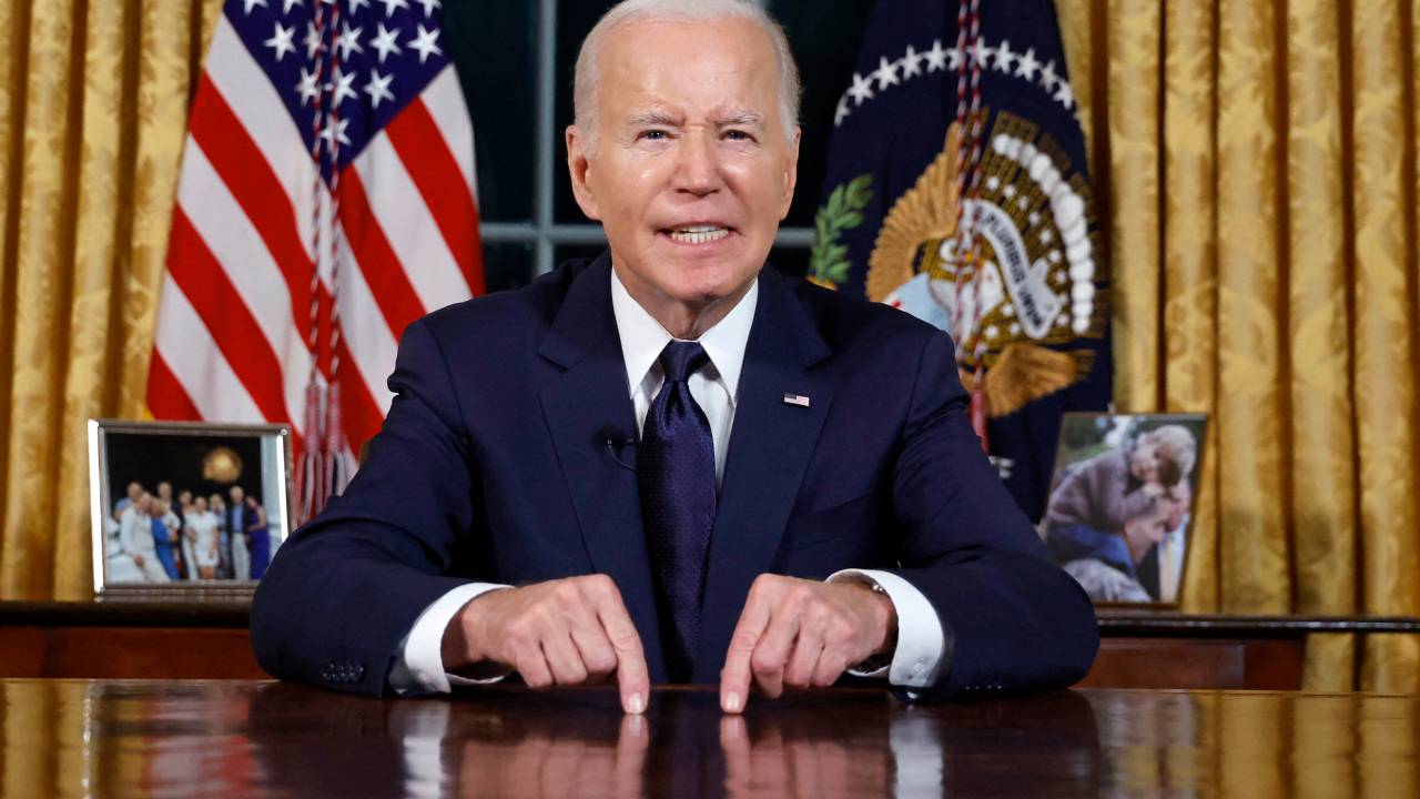 US President Joe Biden addresses the nation on the conflict between Israel and Gaza and the Russian invasion of Ukraine from the Oval Office of the White House in Washington, DC, on October 19, 2023. President Joe Biden will deliver a rare Oval Office speech October 19, 2023 urging Americans to back military aid for Israel and Ukraine at what he calls a perilous moment for democracy around the globe. (Photo by JONATHAN ERNST / POOL / AFP)