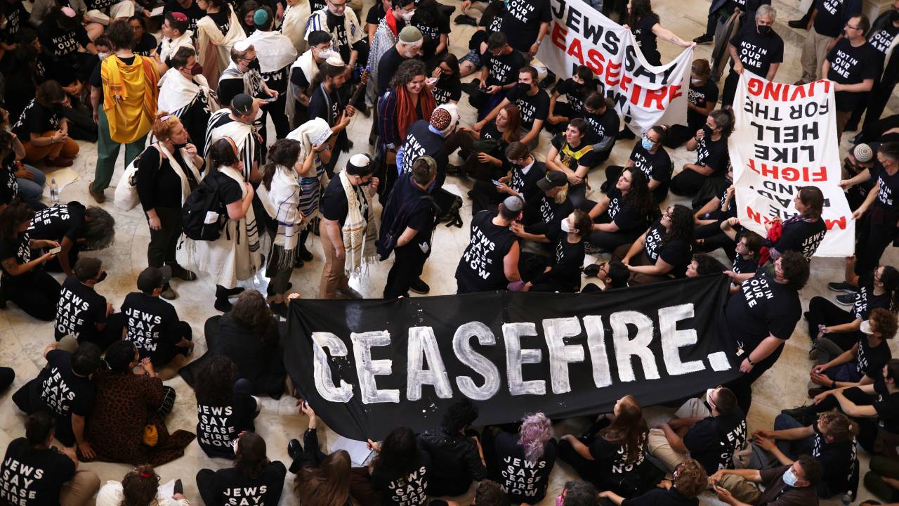 WASHINGTON, DC - OCTOBER 18: Protesters stage a demonstration in support of a cease fire against the Palestinians in Gaza in the Cannon House Office Building on October 18, 2023 in Washington, DC. Members of the Jewish Voice for Peace and the IfNotNow movement staged a rally to call for a cease fire in the IsraelHamas war. Alex Wong/Getty Images/AFP (Photo by ALEX WONG / GETTY IMAGES NORTH AMERICA / Getty Images via AFP)