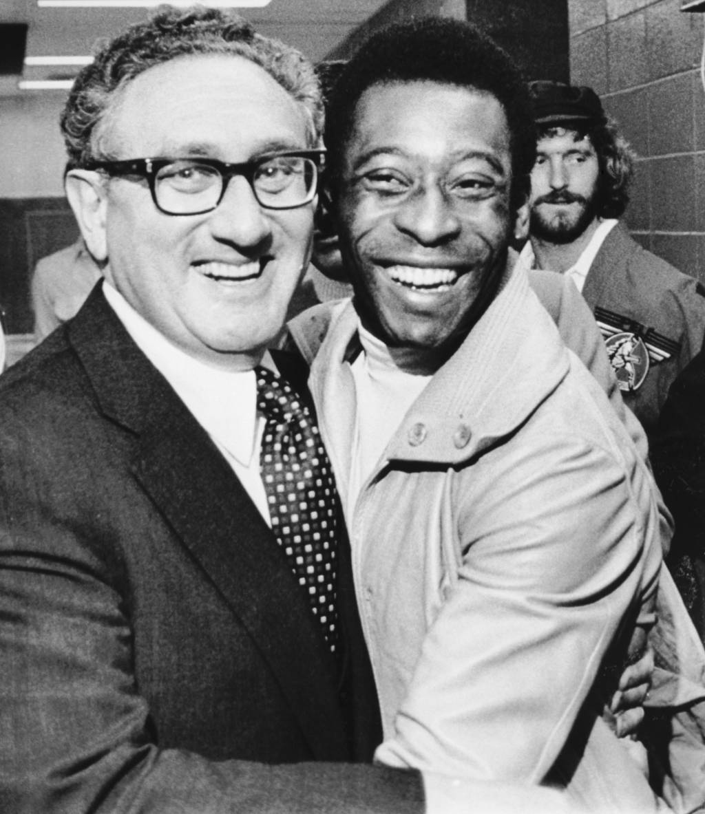 Kissinger and Pele Embrace Kissinger and Pele Embrace