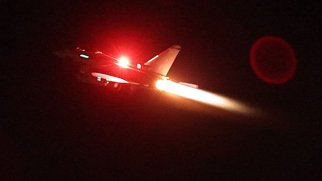 A handout picture released by the British Ministry of Defence (MOD) on January 12, 2024 shows a RAF Typhoon aircraft taking off RAF Akrotiri to join the US-led coalition to conduct air strikes against military targets in Yemen. The United States, UK and eight allies said their joint air strikes on rebel targets in Yemen were aimed at restoring "stability in the Red Sea". The strikes came after weeks of attacks on Red Sea shipping by Iran-backed Huthi forces acting in solidarity with Hamas. (Photo by Sgt Lee Goddard / MOD / AFP) / RESTRICTED TO EDITORIAL USE - MANDATORY CREDIT " AFP PHOTO / CROWN COPYRIGHT 2024" - NO MARKETING NO ADVERTISING CAMPAIGNS - DISTRIBUTED AS A SERVICE TO CLIENTS - NO ARCHIVE - TO BE USED WITHIN 2 DAYS FROM 12/01/2024 (48 HOURS), EXCEPT FOR MAGAZINES WHICH CAN PRINT THE PICTURE WHEN FIRST REPORTING ON THE EVENT /
