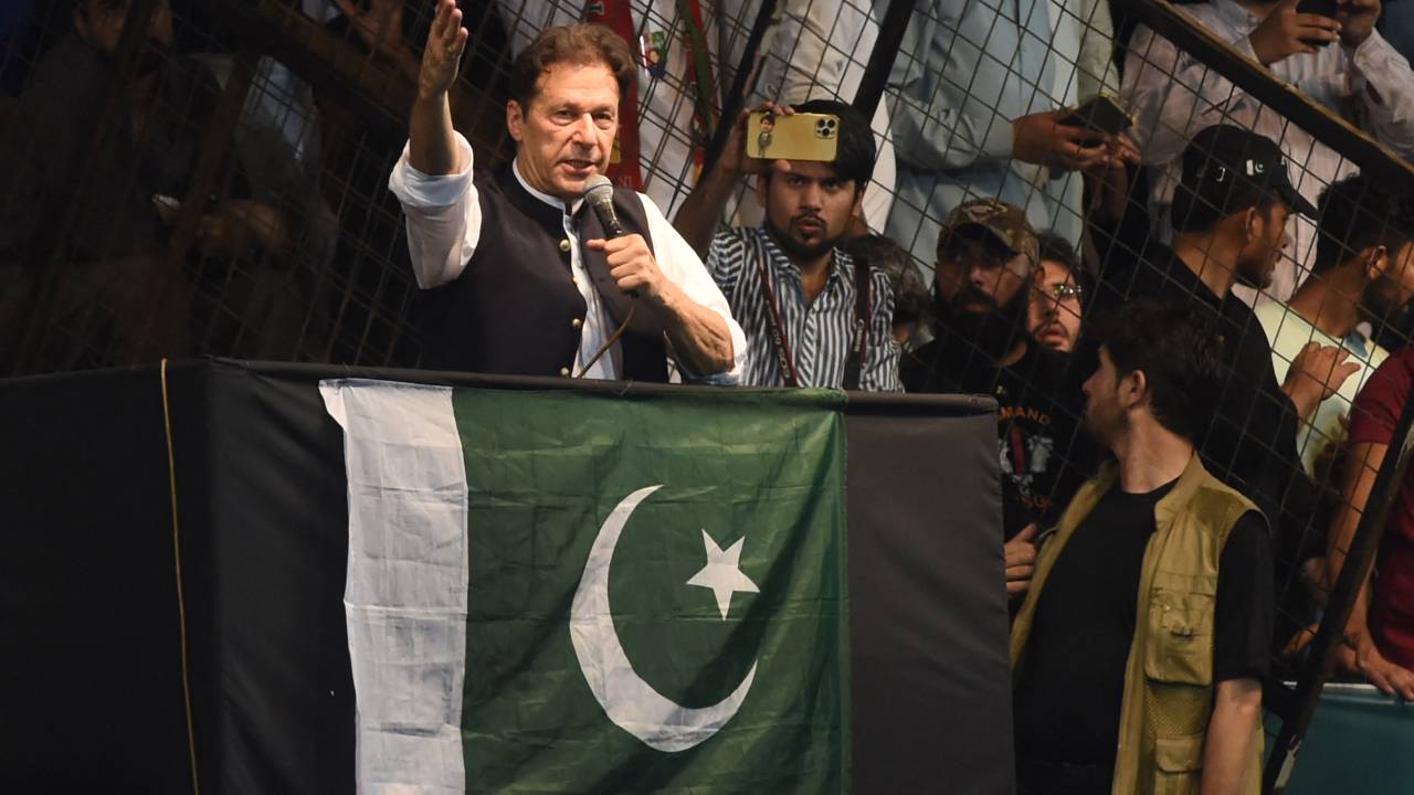 (FILES) Pakistan's former Prime Minister and Pakistan Tehreek-e-Insaf party (PTI) chief Imran Khan, delivers a speech to his supporters during a rally celebrate the 75th anniversary of Pakistan's independence day in Lahore on August 13, 2022. Former Pakistan prime minister Imran Khan was sentenced to 10 years in prison on January 30, 2024, less than two weeks before the country votes in an election his party has been hamstrung from contesting. The same sentence was given to Shah Mehmood Qureshi, who served as foreign minister under Khan whose four-year premiership ended in 2022. (Photo by Arif ALI / AFP)