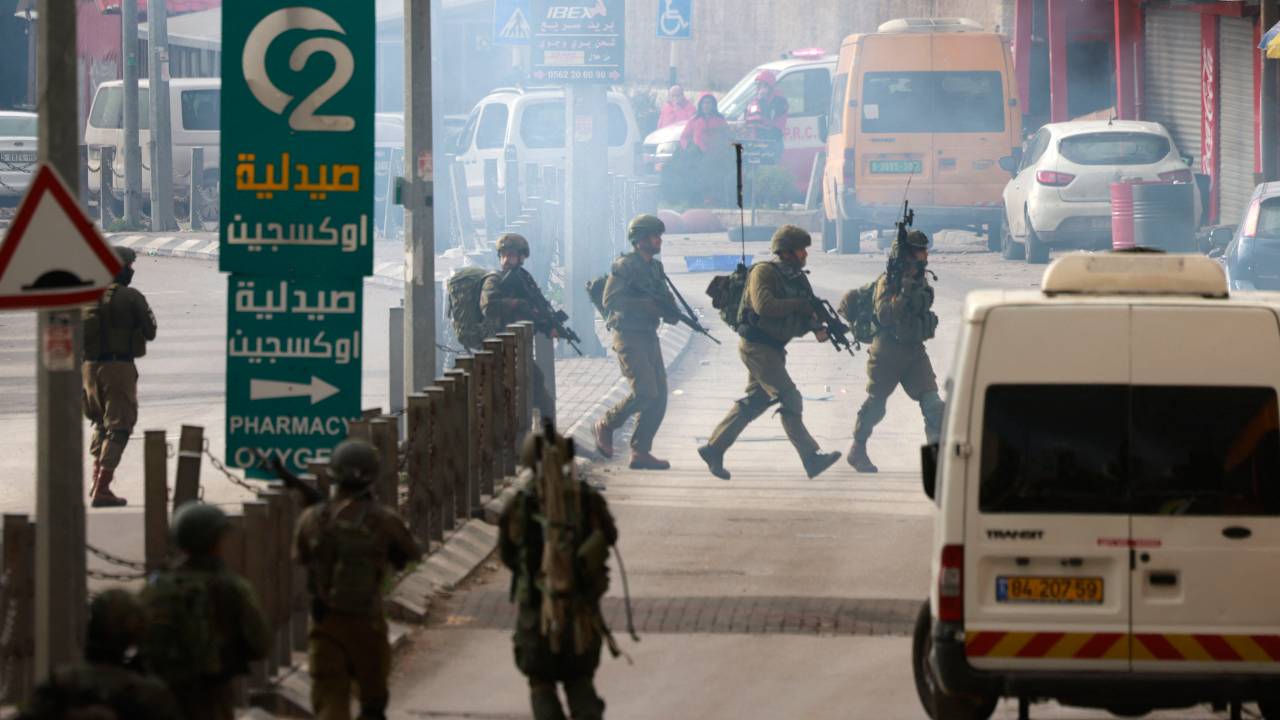 Israeli troops raid the Al-Amari refugee camp near Ramallah, in the occupied West Bank, on March 4, 2024. (Photo by Jaafar ASHTIYEH / AFP)