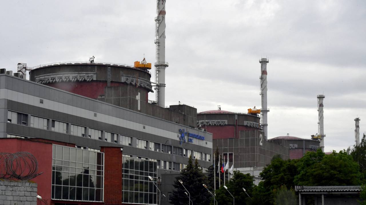 (FILES) A photo shows a view of the Russian-controlled Zaporizhzhia nuclear power plant in southern Ukraine on June 14, 2023. Russia on April 7, 2024, said Ukraine attacked the Moscow-controlled Zaporizhzhia Nuclear Power Plant with a drone, with the International Atomic Energy Agency (IAEA) urging restraint. (Photo by Olga MALTSEVA / AFP)