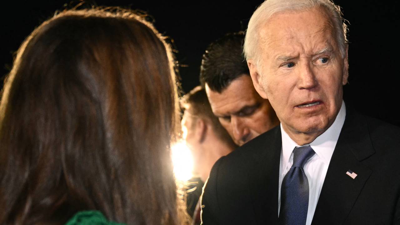 US President Joe Biden speaks to supporters gathered on the tarmac upon his arrival at Raleigh-Durham International Airport in Morrisville, North Carolina, early on June 28, 2024. (Photo by Mandel NGAN / AFP)