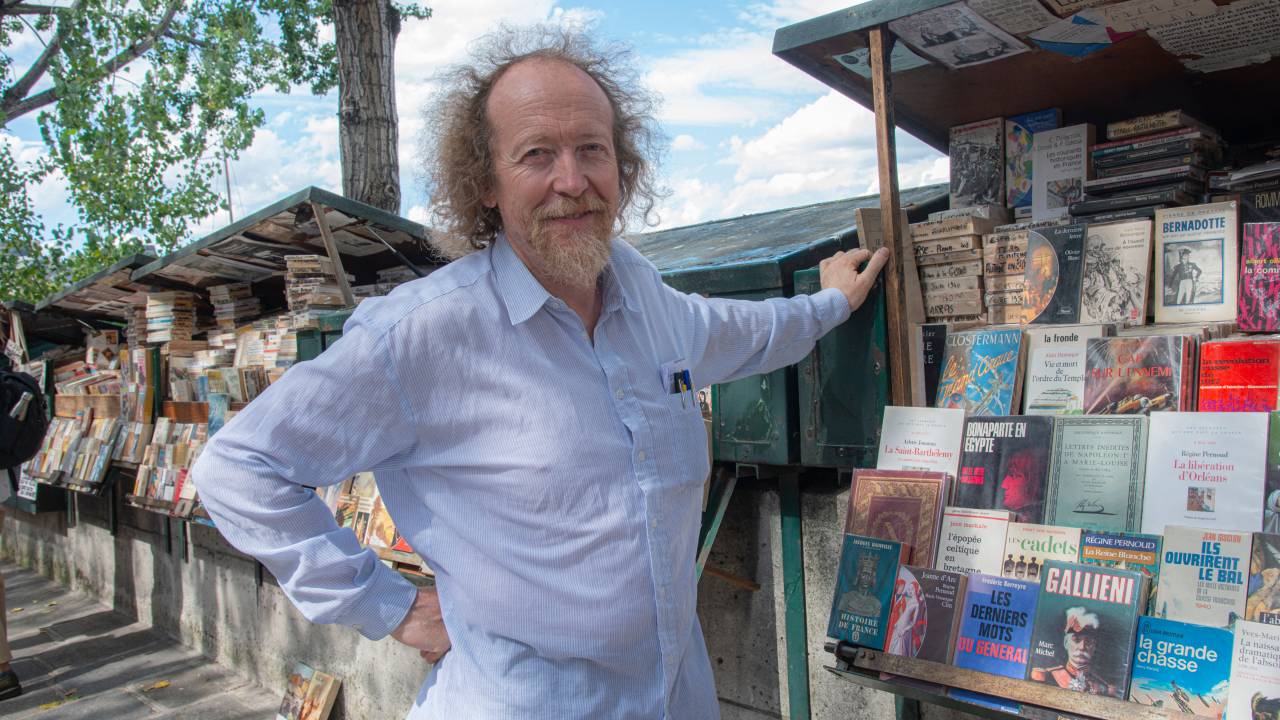 Paris, France, 2023-08-20 : Portrait of Jerome Callais, president of the French cultural association of secondhand booksellers (Association culturelle des bouquinistes de Paris), which has 200 members out of the 233 installed along the banks of the Seine. Photograph by Joao Luiz Bulcao / Hans Lucas.??Paris, France, 2023-08-20 : Portrait de Jerome Callais, president de l Association culturelle des bouquinistes de Paris, qui compte 200 membres sur les 233 installes le long des quais de la Seine. Photographie de Joao Luiz Bulcao / Hans Lucas. (Photo by Joao Luiz Bulcao / Hans Lucas / Hans Lucas via AFP)