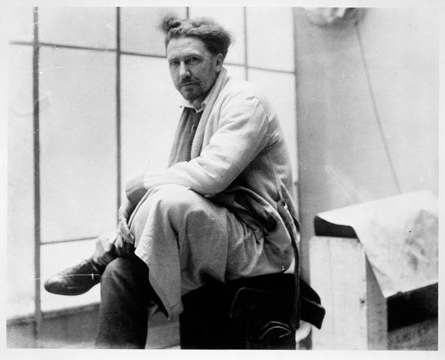 Portrait Of Ezra Pound Portrait of American expatriate, poet, and critic Ezra Pound (1885 - 1972) as he sits cross-legged, early to mid-twentieth century. (Photo by United States Information Agency/PhotoQuest/Getty Images)
