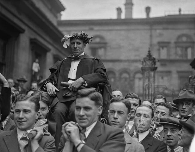 Liddell Chaired 18th July 1924: Eric Liddell (1902 - 1945), winner of the 400 metres at the 1924 Paris Olympics, is paraded around Edinburgh University after his victory. He was known as the 'Flying Scotsman' and was immortalised in the film Chariots of Fire. (Photo by Firmin/Topical Press Agency/Hulton Archive/Getty Images)
