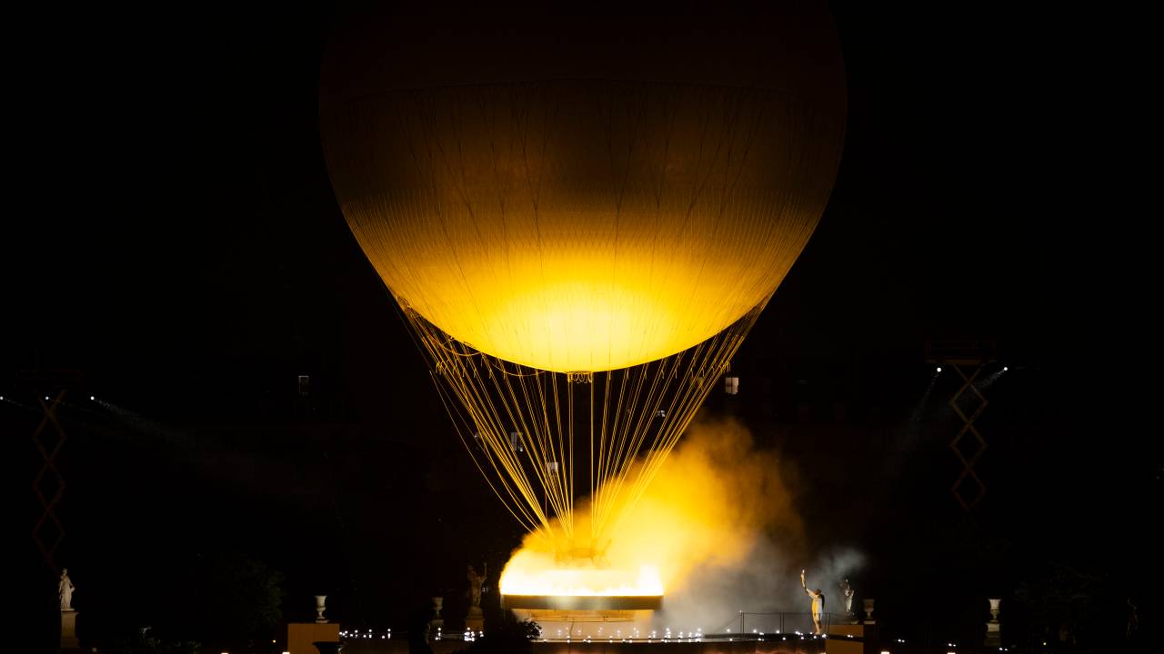 Finale of Opening Ceremony, lighting of flame at the XXXIII Olympic Games, Paris 2024 by the River Seine in Paris, France