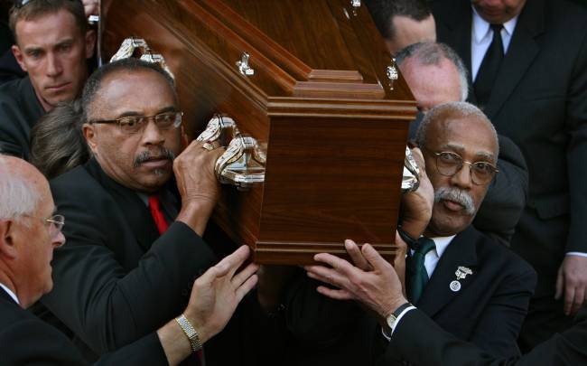 Athletes Tommie Smith, (left) and John Carlos carry Peter Norman’s casket from t (AUSTRALIA OUT) Athletes Tommie Smith, (left) and John Carlos carry Peter Norman's casket from the Williamstown Town Hall on 9th October, 2006. THE AGE NEWS Picture by ANGELA WYLIE. (Photo by Fairfax Media via Getty Images/Fairfax Media via Getty Images via Getty Images)