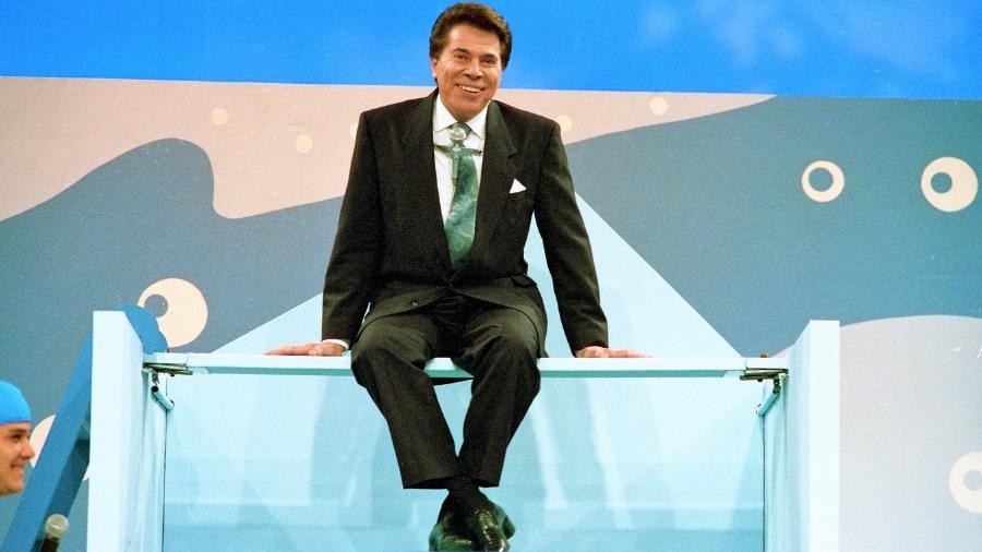 Silvio Santos em tanque de água durante o programa