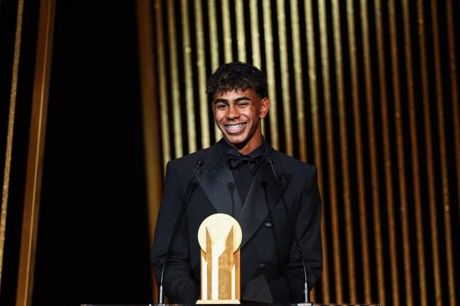 Barcelona's Spanish forward Lamine Yamal receives the Kopa Trophy for best under-21 player during the 2024 Ballon d'Or France Football award ceremony at the Theatre du Chatelet in Paris on October 28, 2024. (Photo by FRANCK FIFE / AFP)