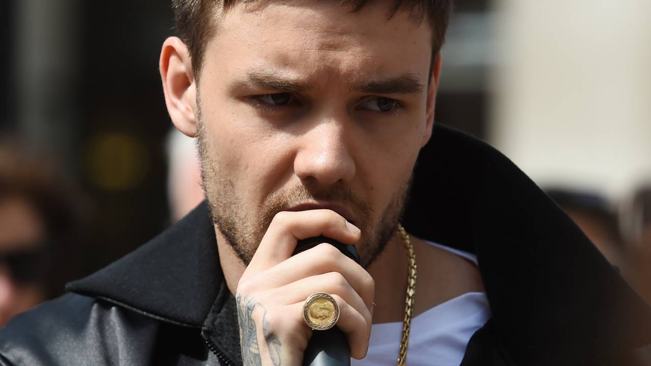 One Direction star Liam Payne performing outside Oxford Circus underground station in London. (Photo by Lauren Hurley/PA Images via Getty Images)