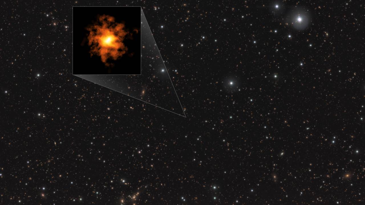 This image shows the galaxy REBELS-25 as seen by the Atacama Large Millimeter/submillimeter Array (ALMA), overlaid on an infrared image of other stars and galaxies. The infrared image was taken by ESO’s Visible and Infrared Survey Telescope for Astronomy (VISTA). In a recent study, researchers found evidence that REBELS-25 is a strongly rotating disc galaxy existing only 700 million years after the Big Bang. This makes it the most distant and earliest known Milky Way-like galaxy found to date.