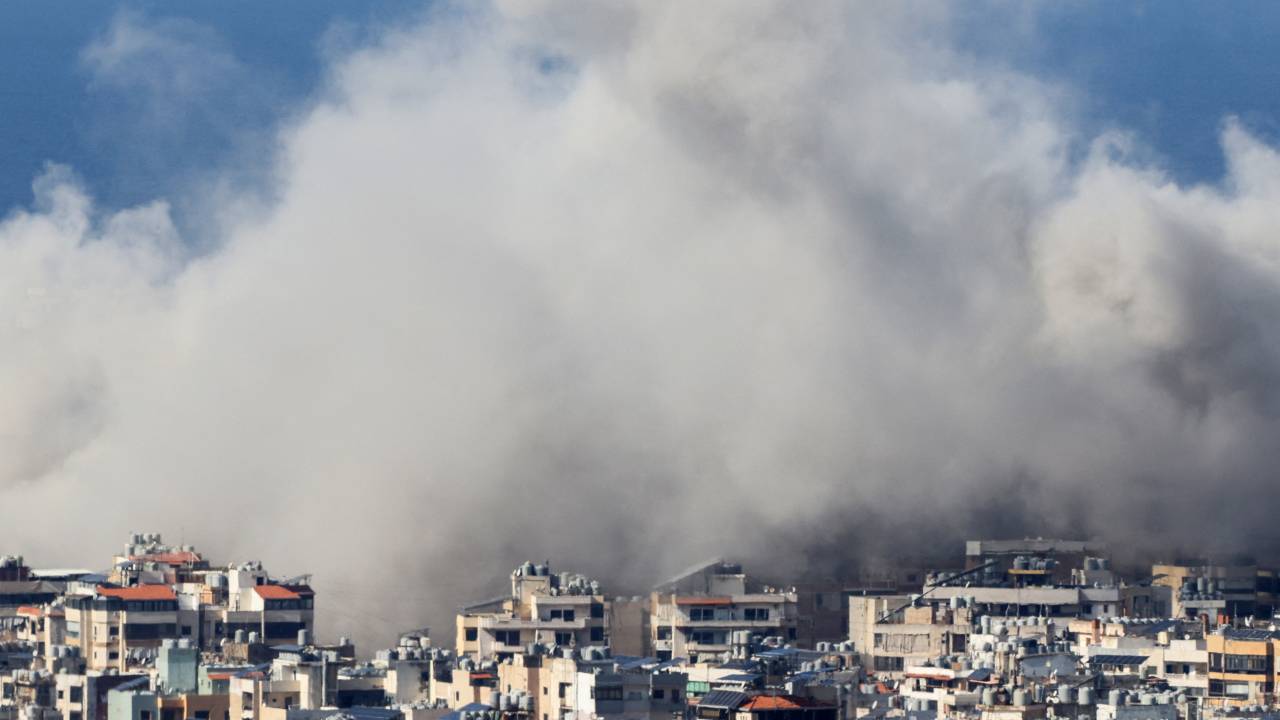 Smoke rises from the site of an Israeli airstrike that targeted a neighbourhood in Beiruts southern suburbs on November 12, 2024. Strikes hit Beirut's southern suburbs on November 12 morning, AFP footage showed, after the Israeli army issued evacuation orders for several neighbourhoods in the area. (Photo by ANWAR AMRO / AFP)